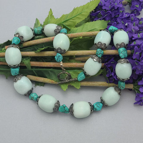 Natural stone necklace with amazonite, turquoise, and vintage-inspired silver bead caps