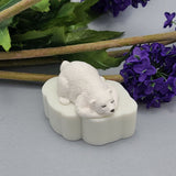 A flexible silicone mold featuring a detailed and cute polar bear design, perfect for crafting resin jewelry, polymer clay figurines, and DIY projects.