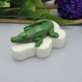 A flexible silicone mold featuring a detailed and realistic crocodile design, perfect for crafting resin jewelry, polymer clay figurines, and DIY project