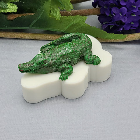 A flexible silicone mold featuring a detailed and realistic crocodile design, perfect for crafting resin jewelry, polymer clay figurines, and DIY project