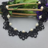 Handmade black beaded necklace and earrings set.