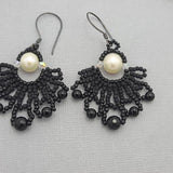 Handmade black beaded necklace and earrings set.