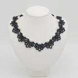 Handmade black beaded necklace and earrings set.