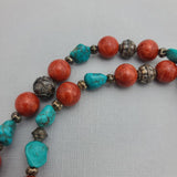 Stylish Beaded Necklace with Turquoise, Coral, and Antique Sterling Silver Beads.