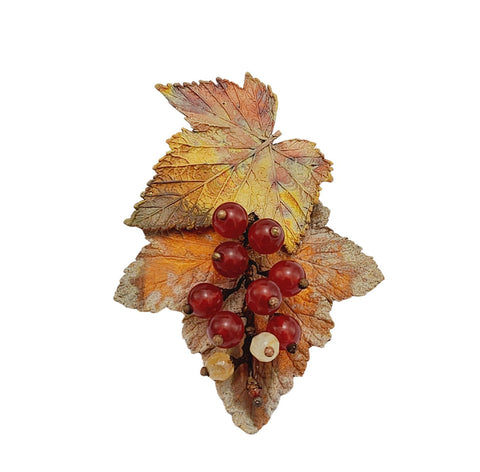 Handmade Victorian electroformed copper brooch with a real red currant leaf and berries, featuring torch-fired blues and purples—nature preserved in unrepeatable metallic art