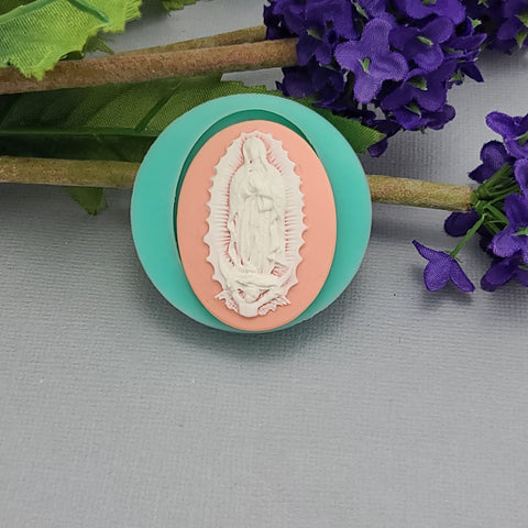 A flexible silicone mold featuring a detailed and elegant design of the Virgin Mary, perfect for crafting resin jewelry, polymer clay figurines, and DIY religious art