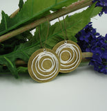 Earrings Silver Swirl and Round Ox Brass  Dangle Earrings.