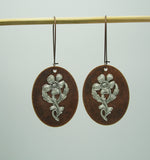 Ox Silver Flower on Ox Copper Oval Dangle Earrings.