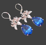 silver-orchid-and-sapphire-faceted-teardrop-crystal-earrings